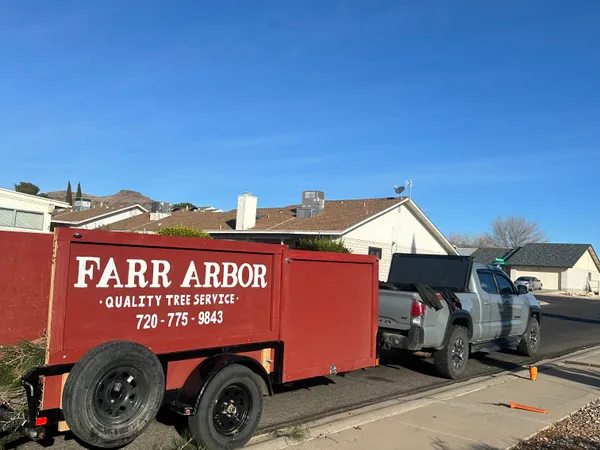 Farr Arbor branded trailer with phone number